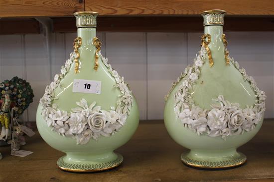 Pair of green & white floral ceramic vases(-)